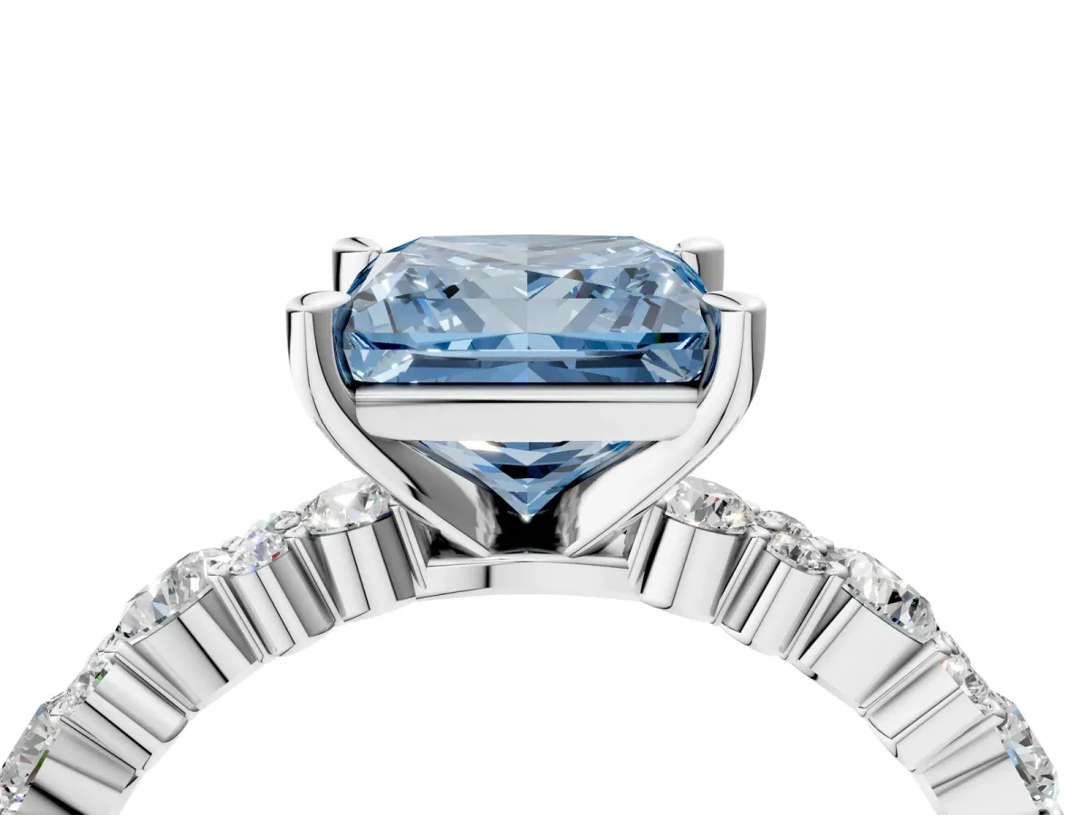 Fancy Blue Princess Cut Diamond Side Stone Solitaire Ring with Round and Four-Prong Setting Platinum