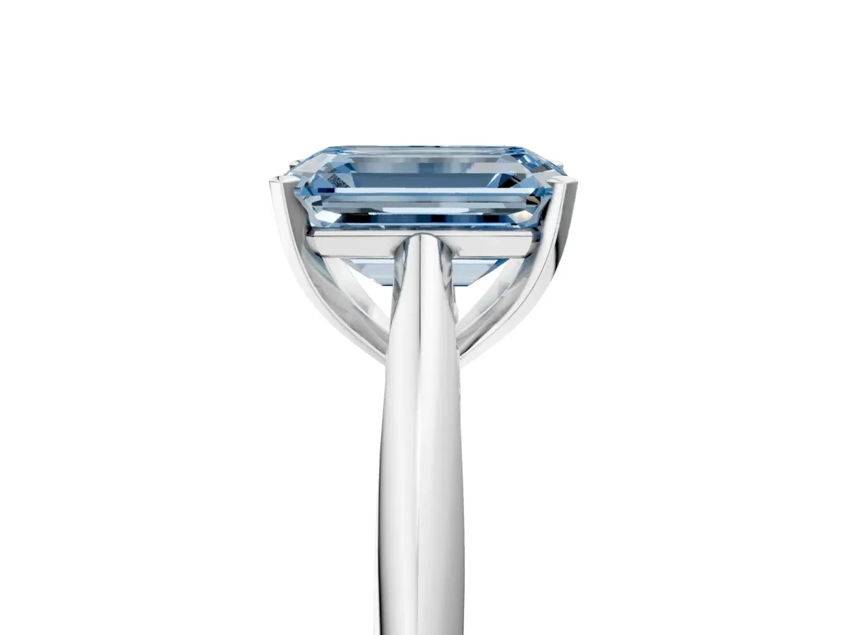 Fancy Blue Emerald Cut Diamond Solitaire Engagement Ring with Cathedral Setting and Four-Prong Mount White gold