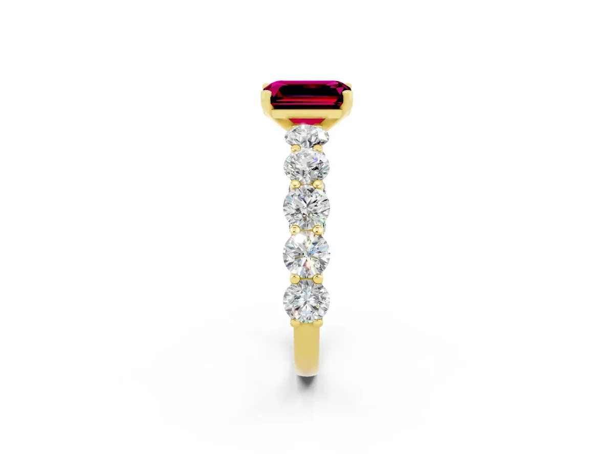 Emerald Cut Garnet Prong Setting with Side Stones on a Pave Band Yellow gold