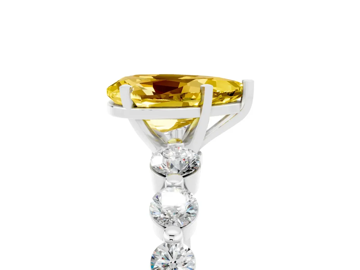 Pear Cut Solitaire Yellow Sapphire Ring with Pave Band and Four-Prong Setting Silver