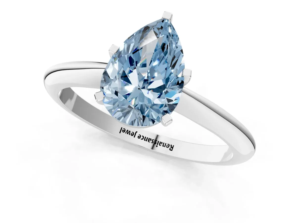 Fancy Blue Pear Cut Diamond Solitaire Engagement Ring with Classic Band and Four-Prong Setting Silver