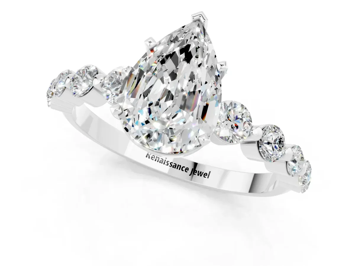 Pear Cut Solitaire Moissanite Ring with Pave Band and Four-Prong Setting Silver