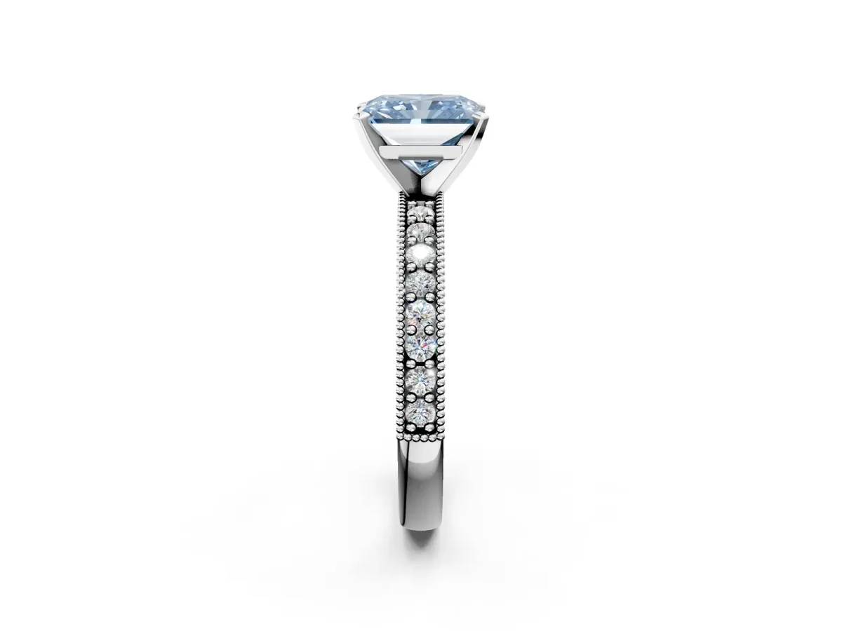 Fancy Blue Radiant Cut Diamond Milgrain Pavé Engagement Ring with Four-Prong Setting Platinum