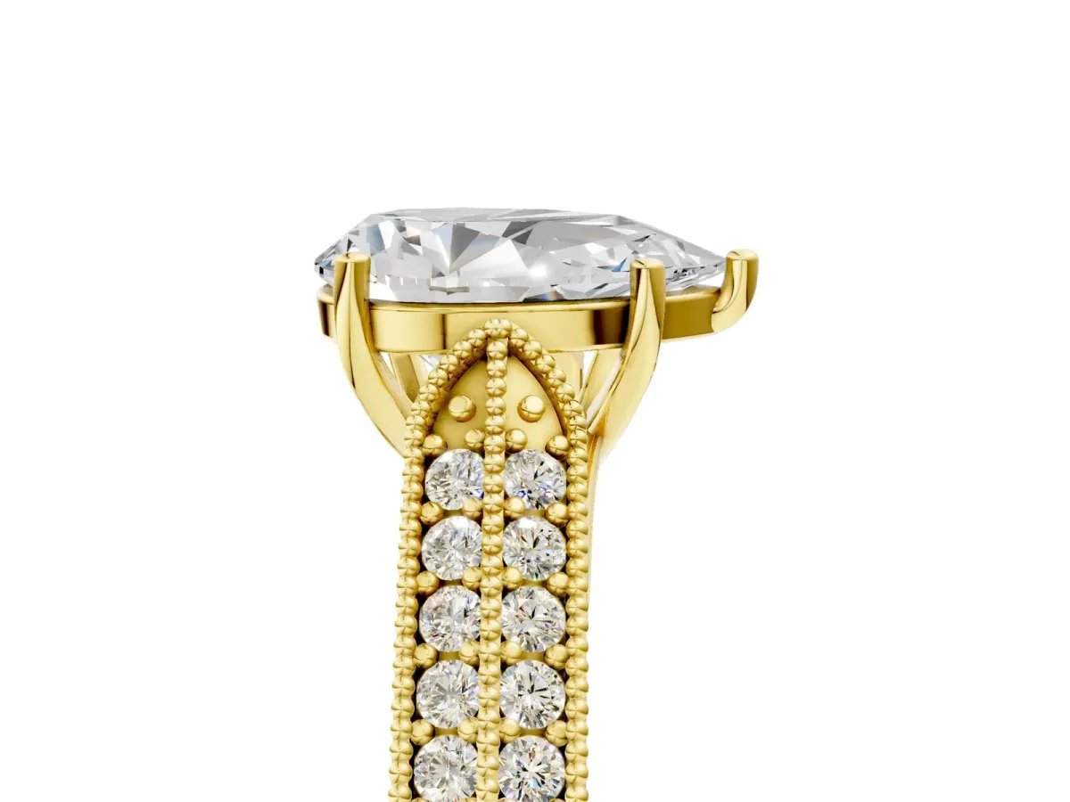 Pear Cut Cut Pave Split Shank Engagement Ring with Four-Prong Setting Yellow gold
