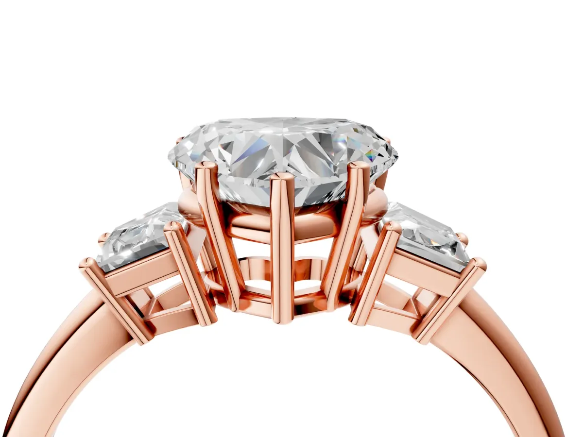 Heart Cut Diamond Three-Stone Ring with Trapezoid Side Stones and Prong Setting Rose gold