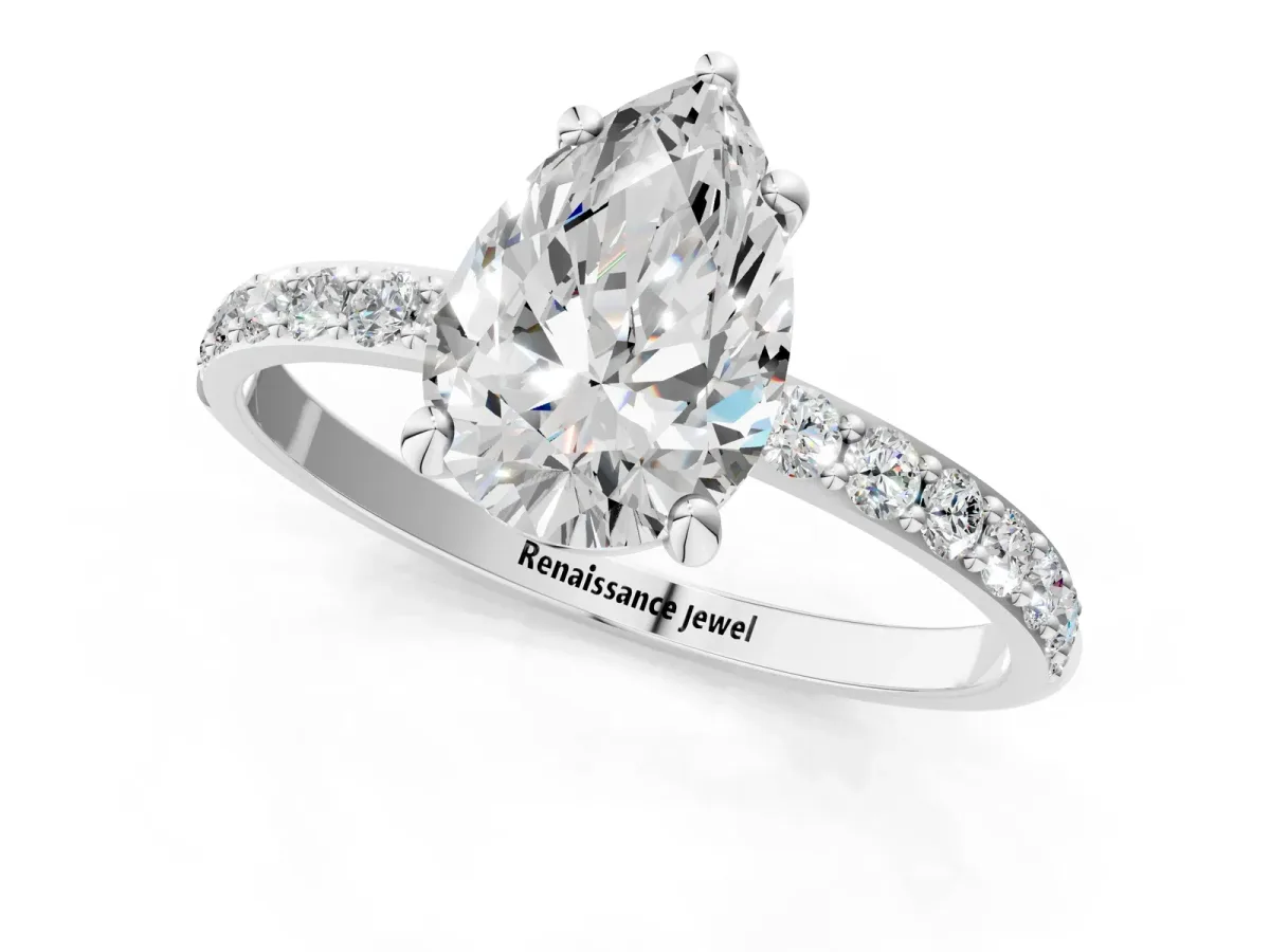 Pear Cut Diamond Solitaire Ring with Round Moissanite Pavé Band and Prong Setting Silver