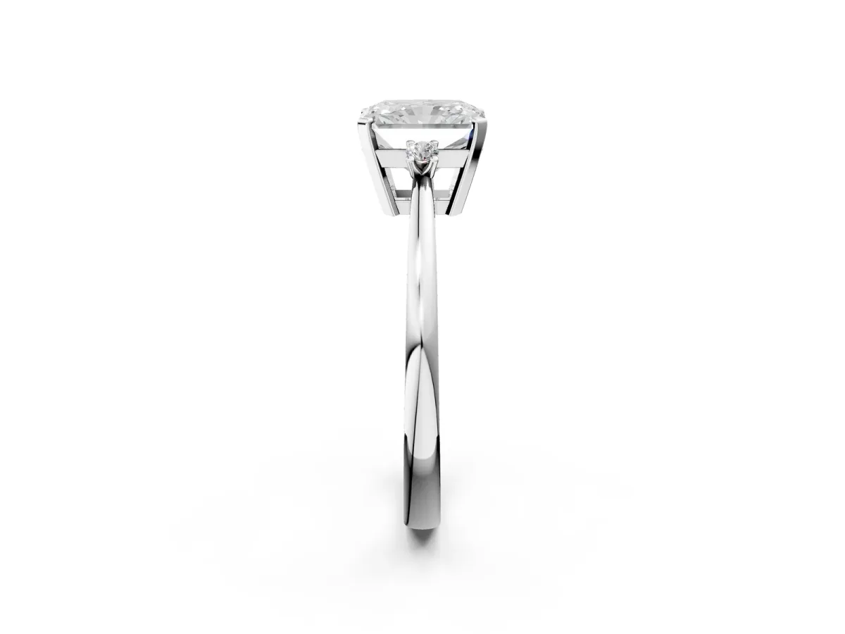 Radiant Cut Cut Three-Stone Solitaire Ring with Round Accent Diamonds and Four-Prong Setting Platinum