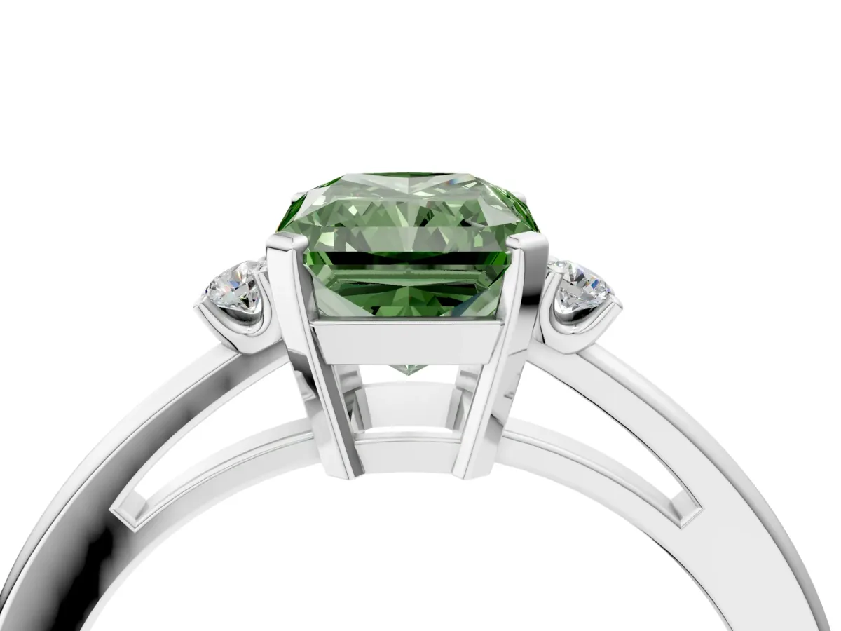Fancy Green Radiant Cut Cut Three-Stone Solitaire Ring with Round Accent Diamonds and Four-Prong Setting Platinum