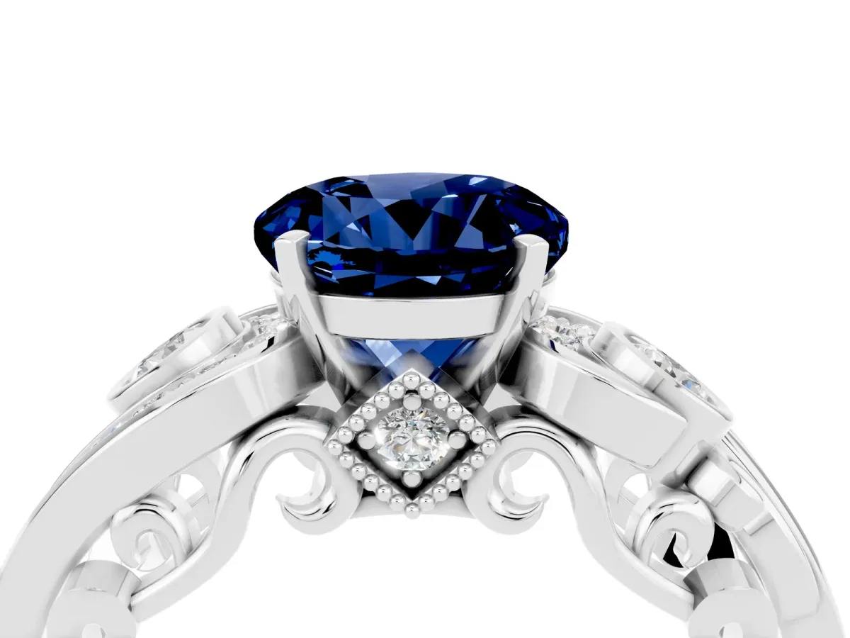 Round Cut Blue Sapphire Solitaire Ring with Milgrain Pavé Band and Four-Prong Setting Silver