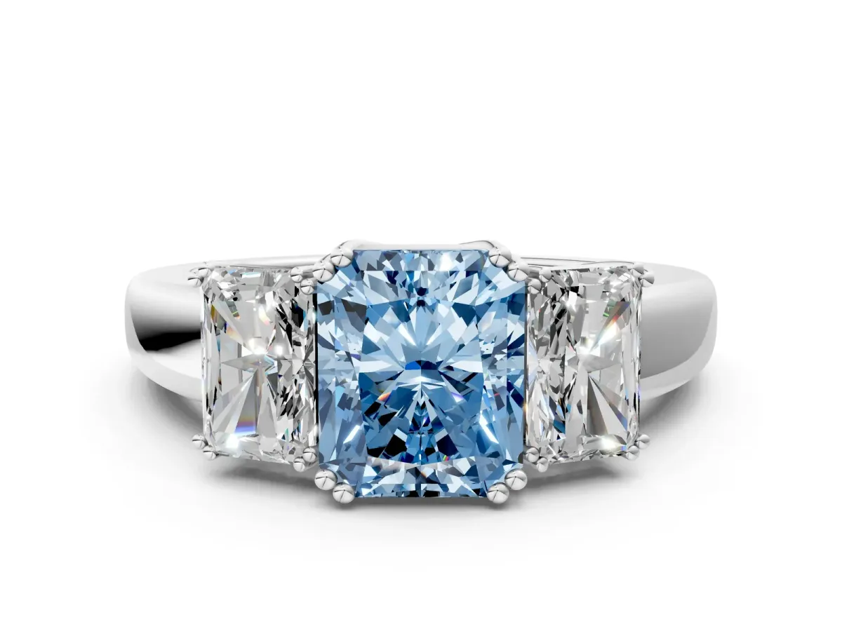 Fancy Blue Three-Stone Radiant Cut Cut Diamond Ring with Channel Set Band and Four-Prong Setting Silver