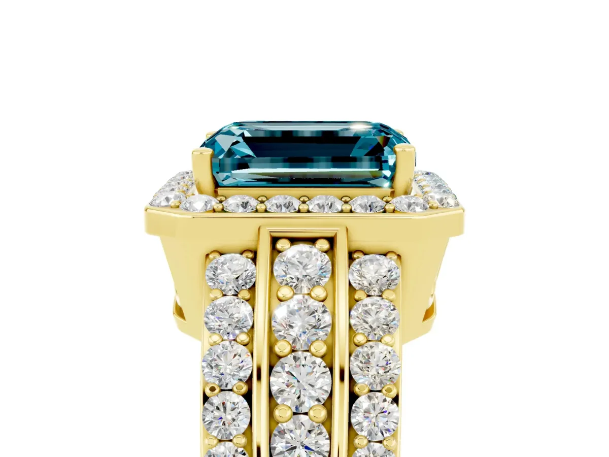 Emerald Cut Halo Blue Topaz Ring with Round Split Shank and Prong Setting Yellow gold