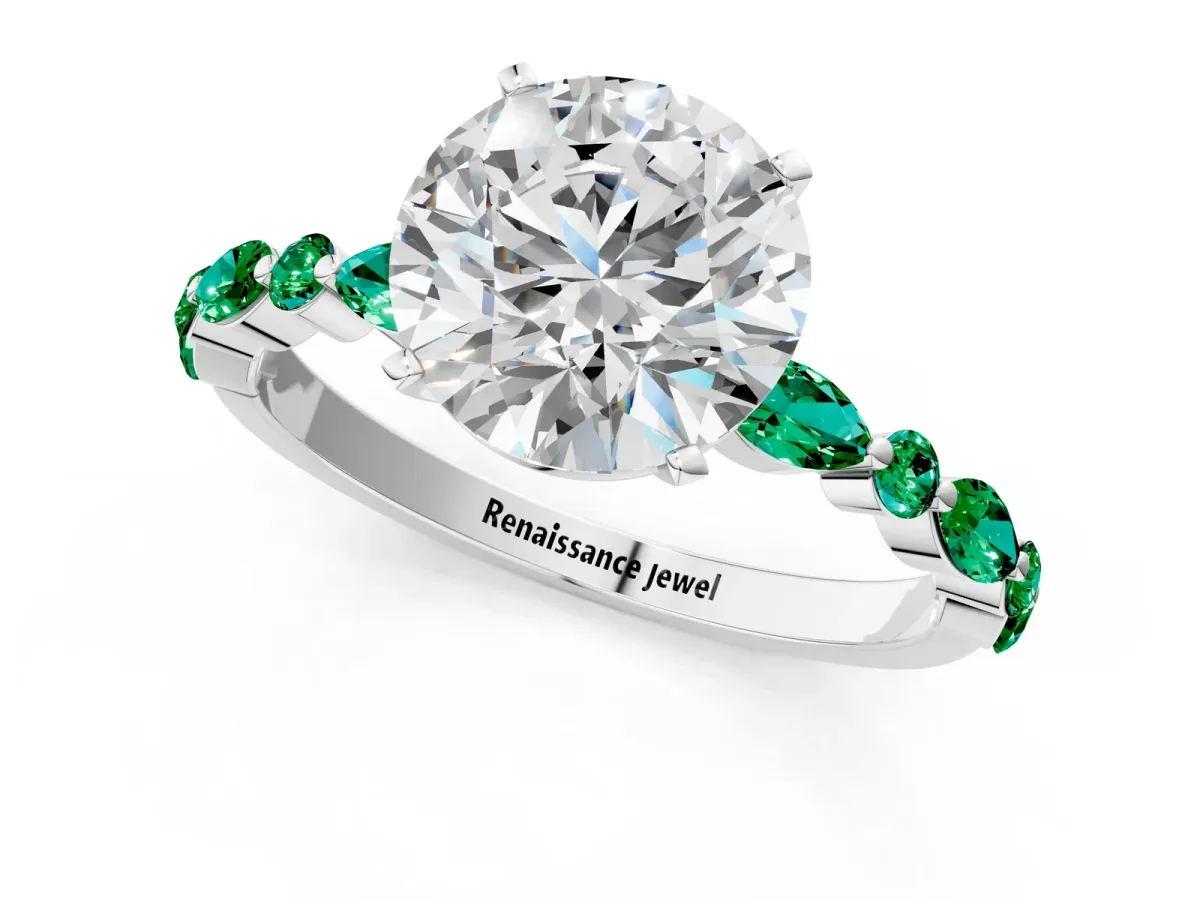 Round Cut Diamond Ring with Marquise and Round Emerald Side Stones and Four-Prong Setting Silver