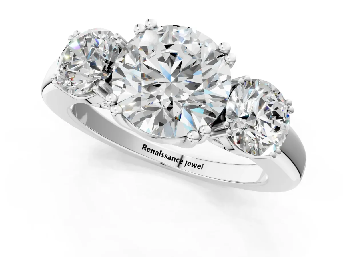 Three-Stone Round Cut Cut Diamond Ring with Channel Set Band and Four-Prong Setting White gold