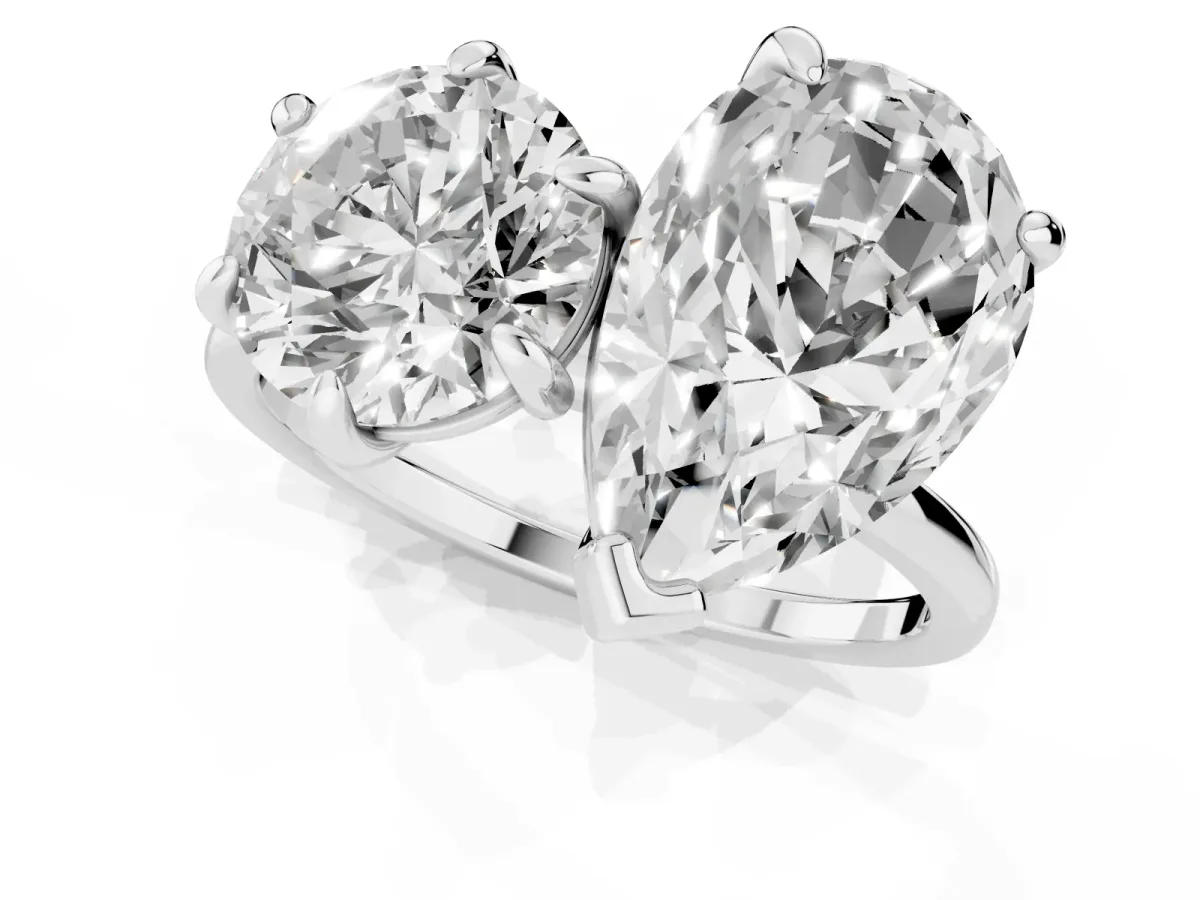Round and Pear Toi Moi Ring with Prong Setting and Plain Band Silver