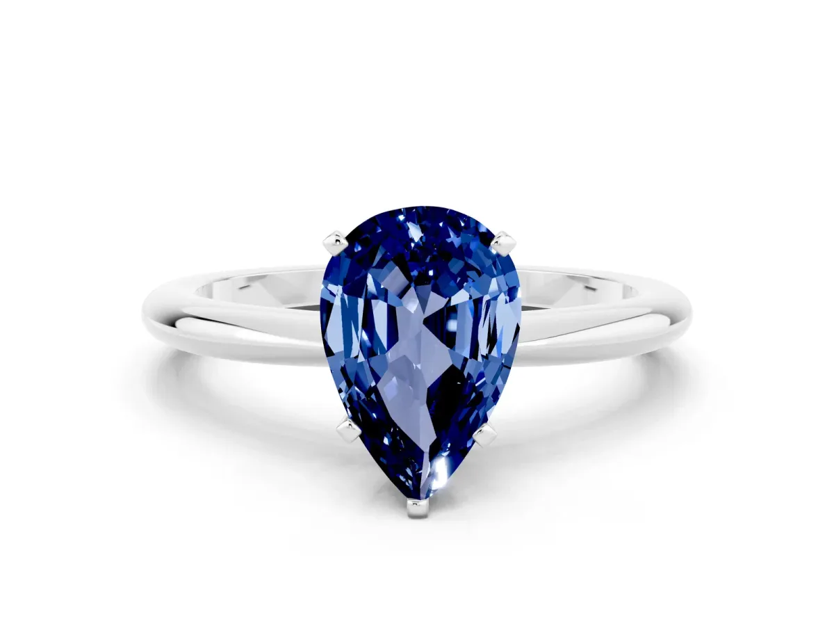 Pear Cut Blue Sapphire Solitaire Ring with Six-Prong Setting and Classic Band Silver