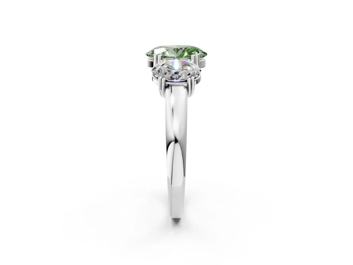 Fancy Green Three-Stone Oval Cut Cut Diamond Ring with Channel Set Band and Four-Prong Setting Platinum