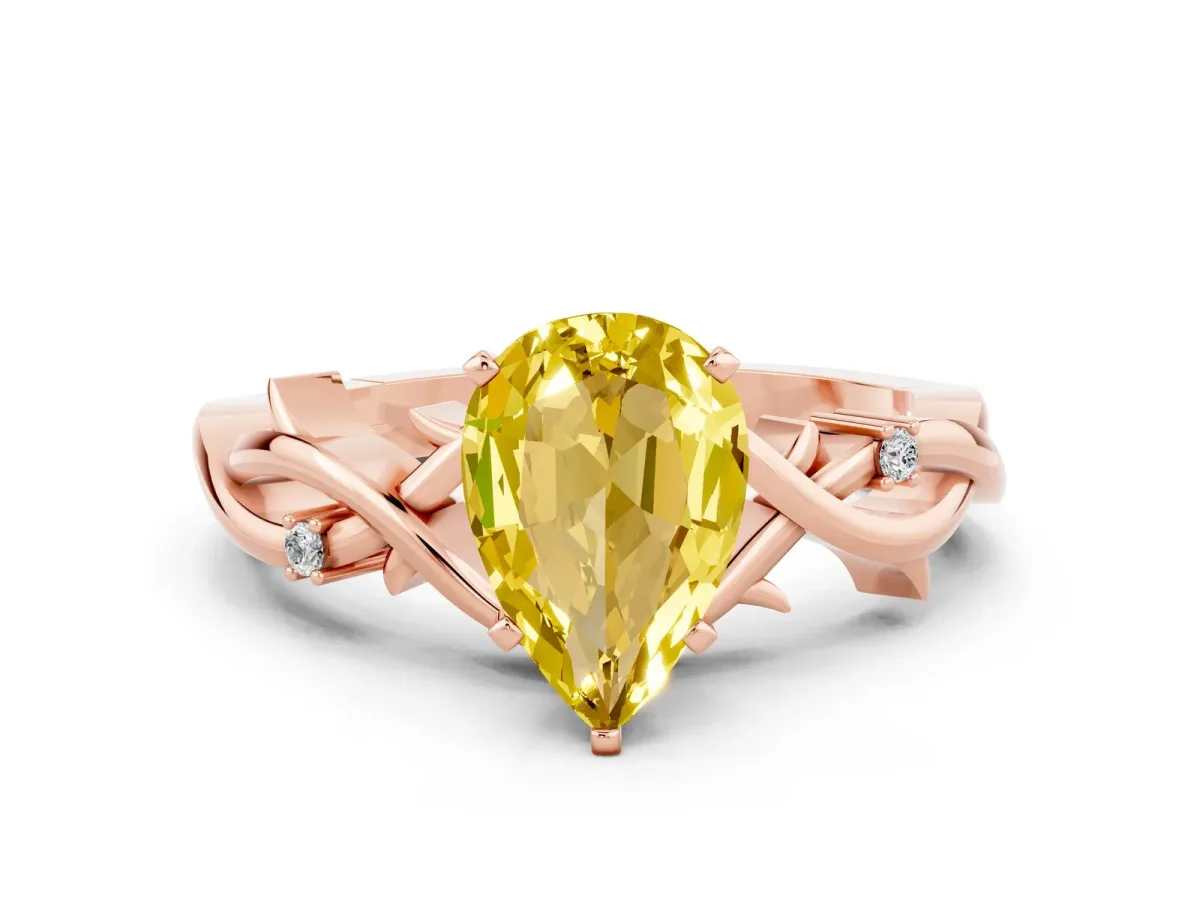 Pear Cut Yellow Sapphire Solitaire Ring with Twisted Band and Prong Setting Rose gold