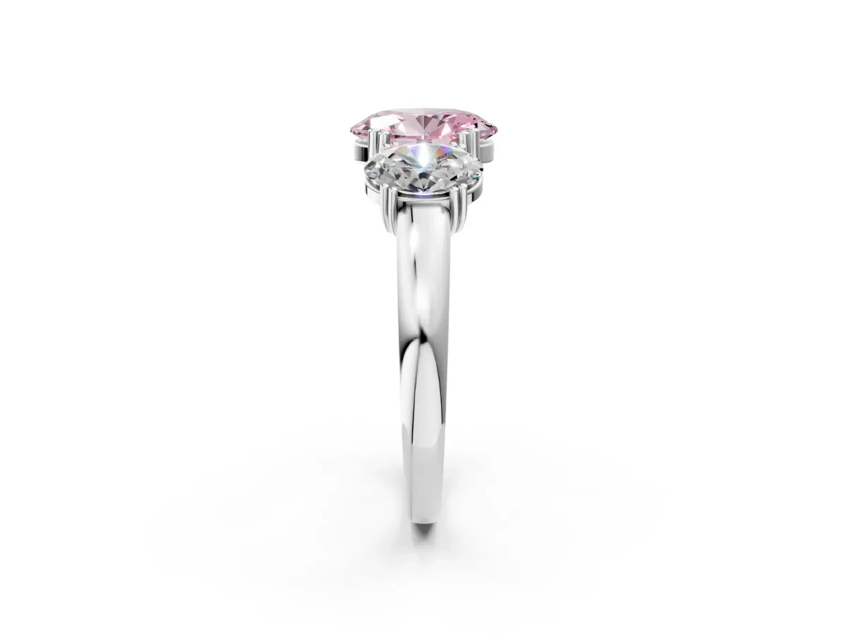 Fancy Pink Three-Stone Oval Cut Cut Diamond Ring with Channel Set Band and Four-Prong Setting Silver