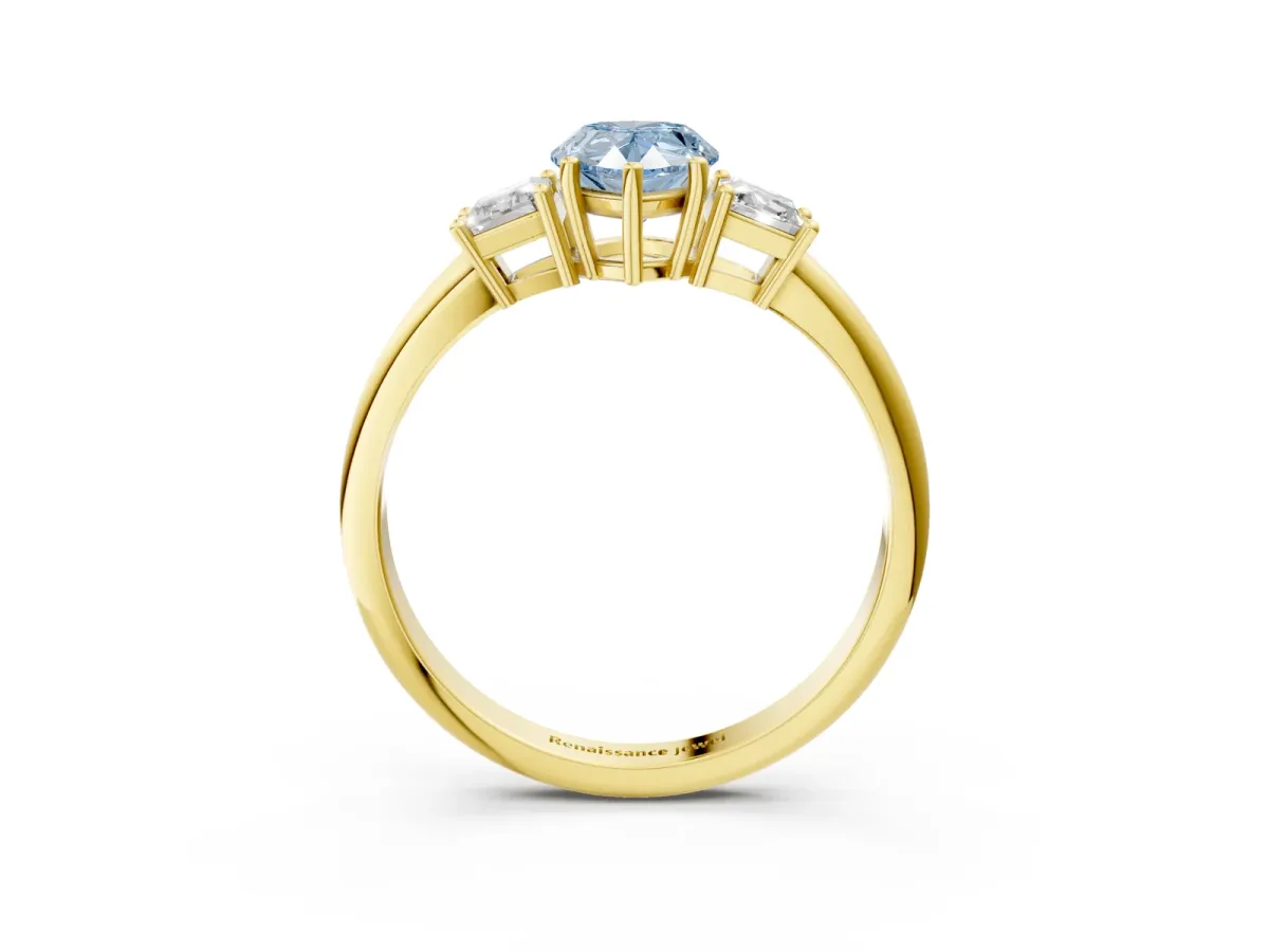 Fancy Blue Pear Cut Diamond Three-Stone Ring with Trapezoid Side Stones and Prong Setting Yellow gold