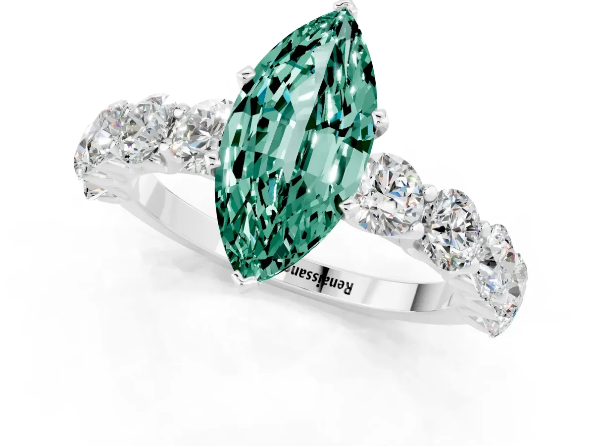Marquise Cut Green Sapphire Prong Setting with Side Stones on a Pave Band Silver