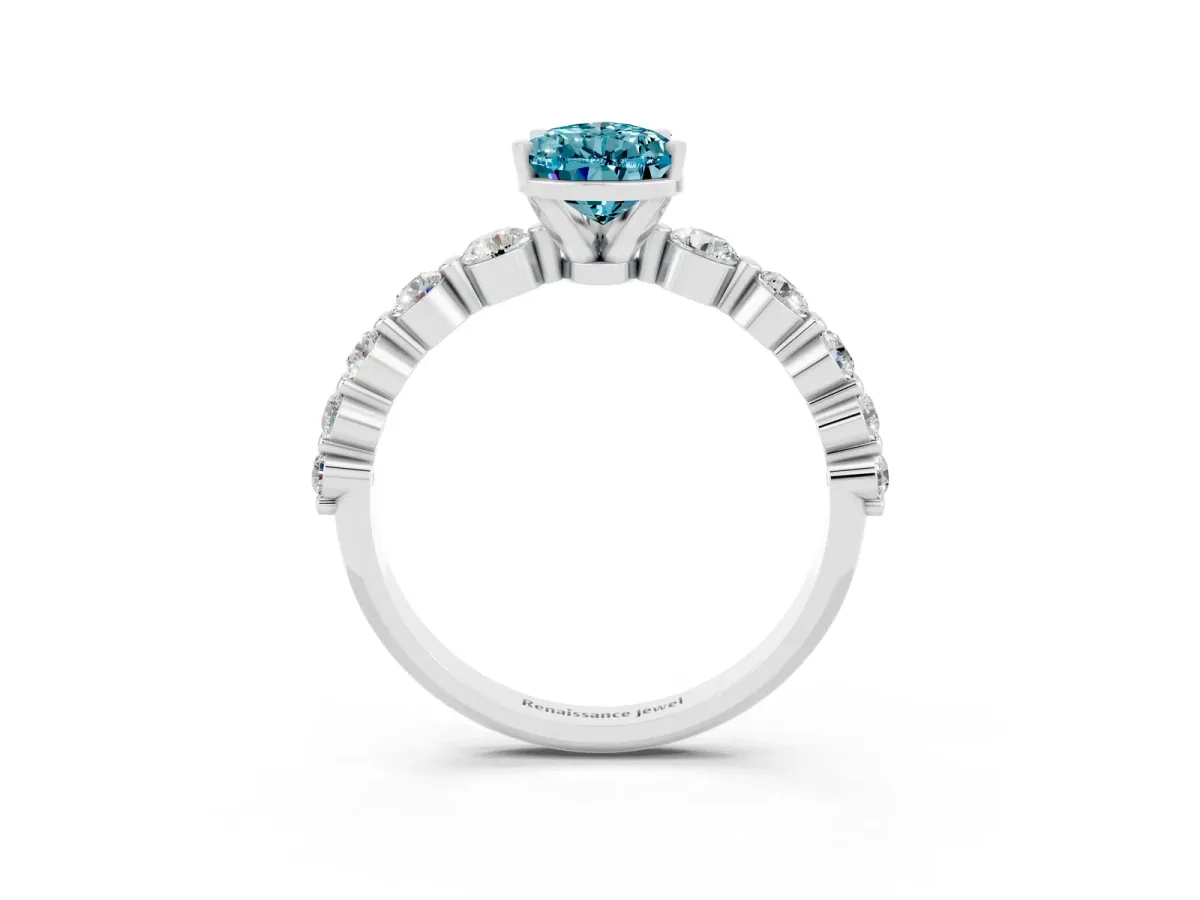 Pear Cut Solitaire Blue Topaz Ring with Pave Band and Four-Prong Setting Silver