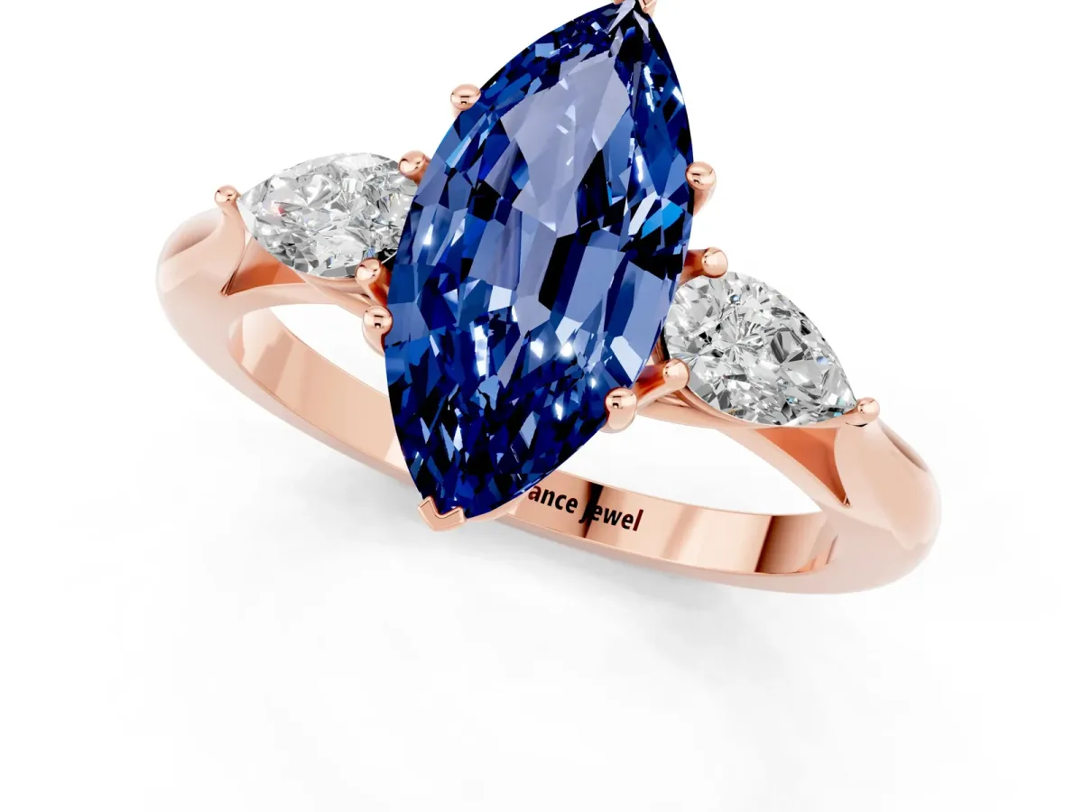 Marquise Cut Blue Sapphire Three-Stone Ring with Pear Side Stones and Prong Setting Rose gold