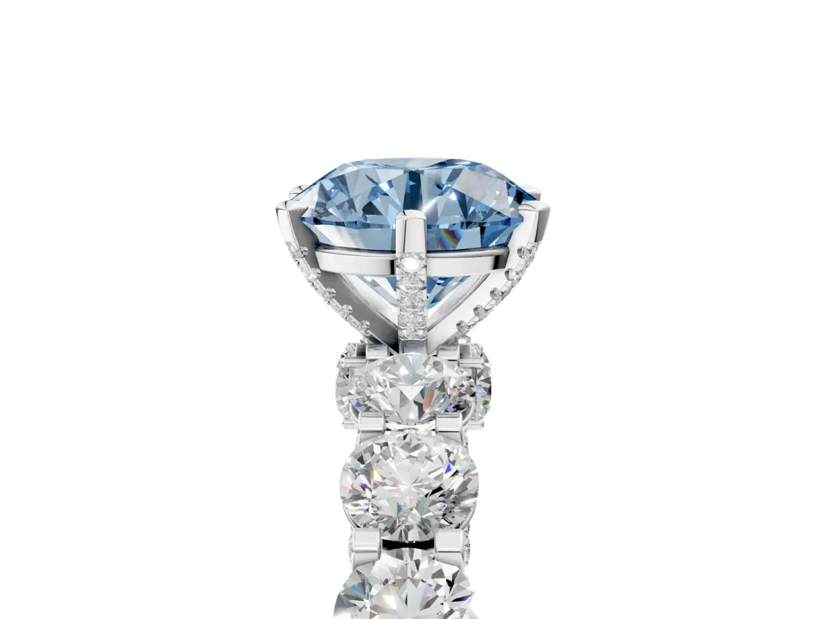 Fancy Blue Round Cut Diamond Side Stone Engagement Ring with Four-Prong Setting White gold