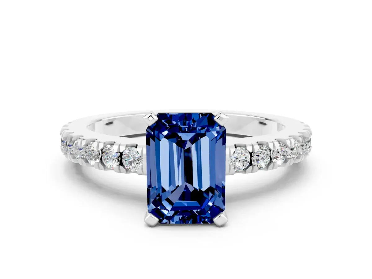 Emerald Cut Solitaire Blue Sapphire with Pavé Band and Four-Prong Setting Silver
