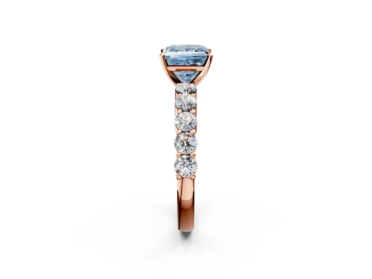 Fancy Blue Princess Cut Diamond Solitaire Ring with Shared Prong Round Side Stones Rose gold
