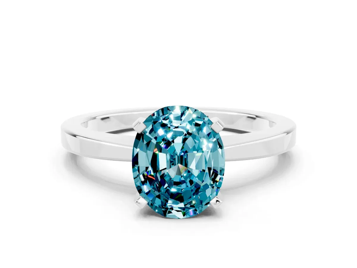 Oval Cut Blue Topaz Solitaire Engagement Ring with Classic Band and Four-Prong Setting Silver