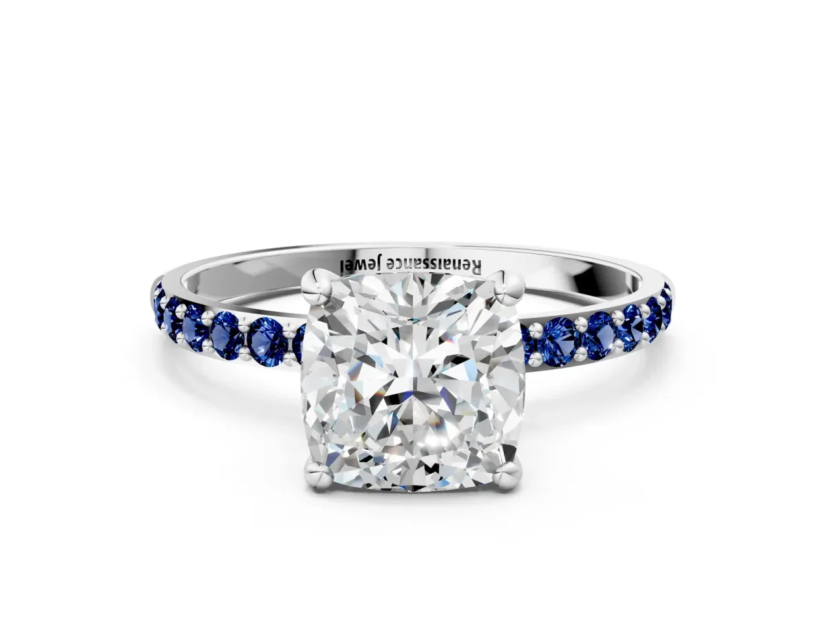 Cushion Cut Diamond Solitaire Ring with Round Blue Sapphire Pavé Band and Prong Setting Silver