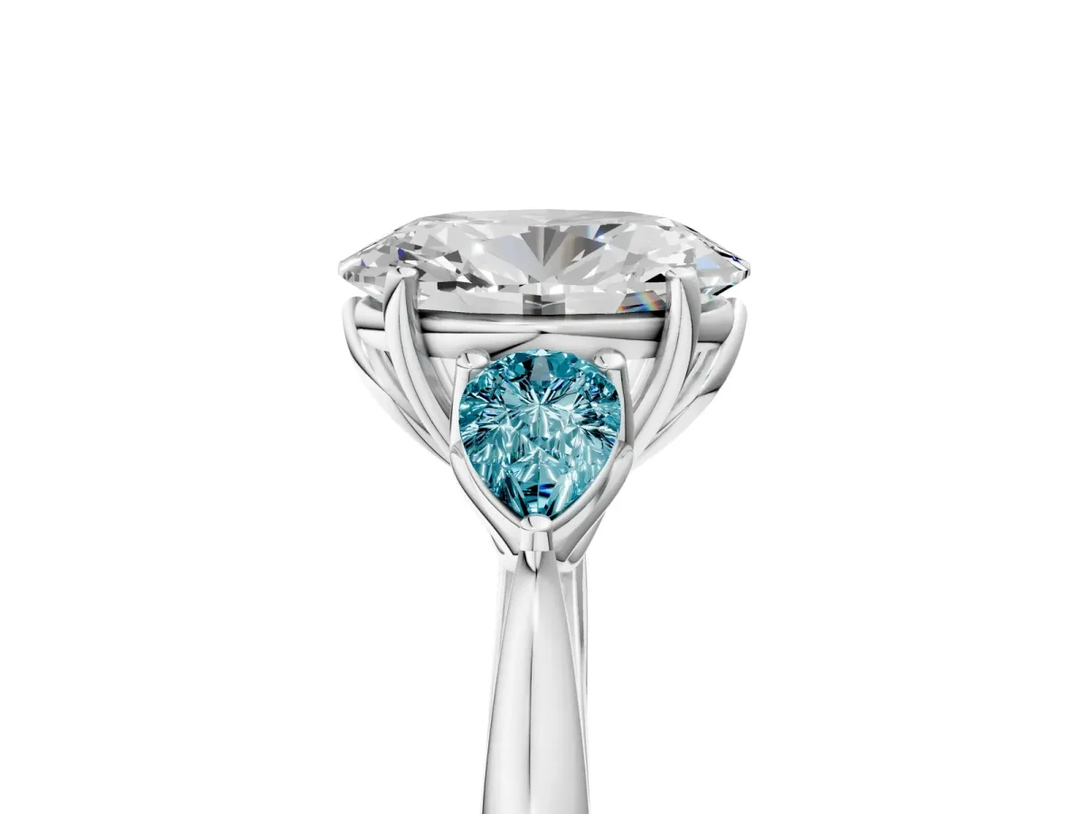 Oval Cut Diamond Three-Stone Ring with Pear Blue Topaz Side Stones and Prong Setting Silver