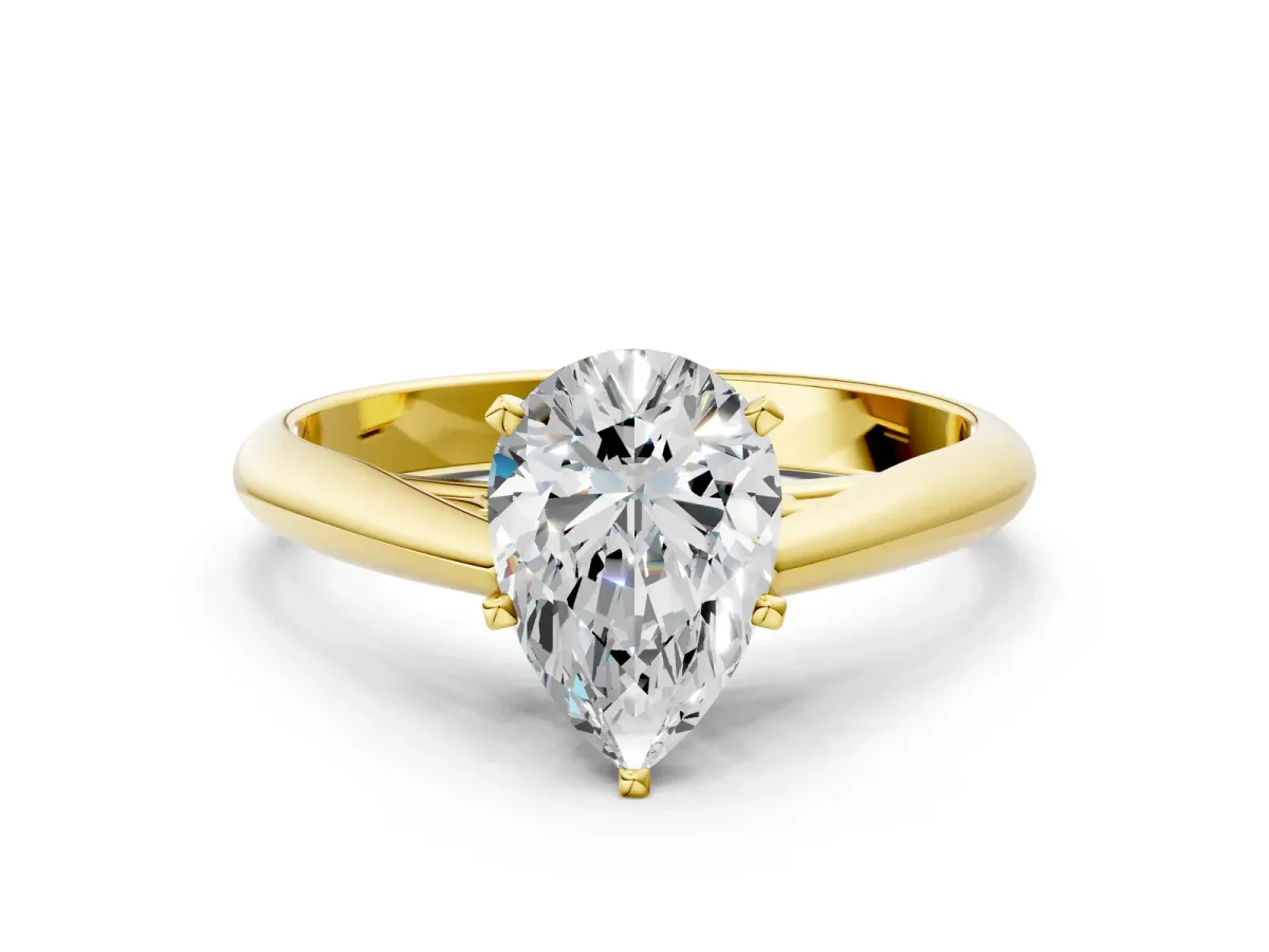 Pear Cut Diamond Solitaire Engagement Ring with Cathedral Setting and Four-Prong Mount Yellow gold