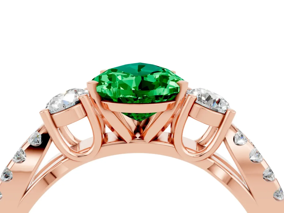 Pear Cut Emerald Three-Stone Ring with Pavé Split Shank and Four-Prong Setting Rose gold