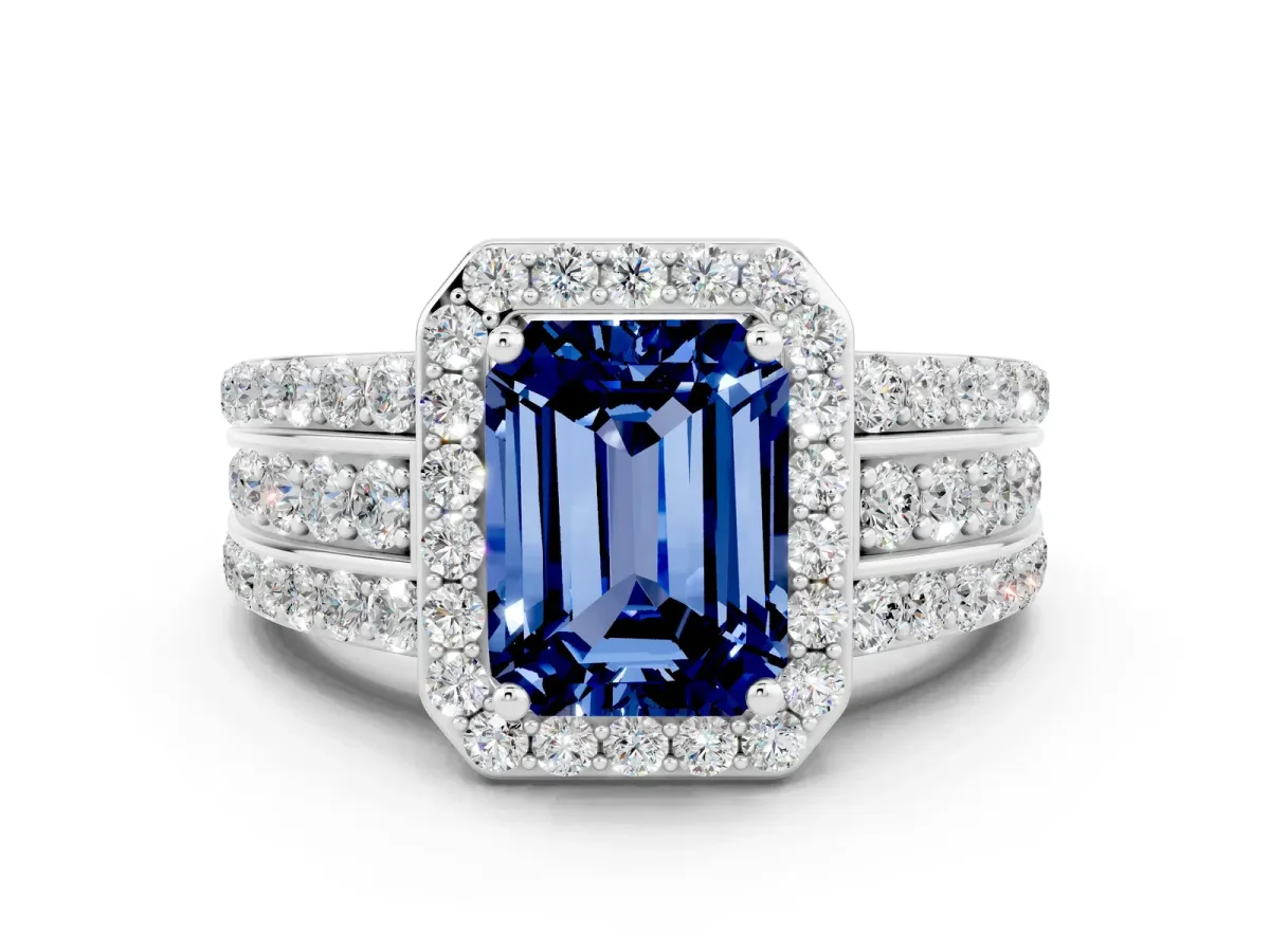 Emerald Cut Halo Blue Sapphire Ring with Round Split Shank and Prong Setting White gold
