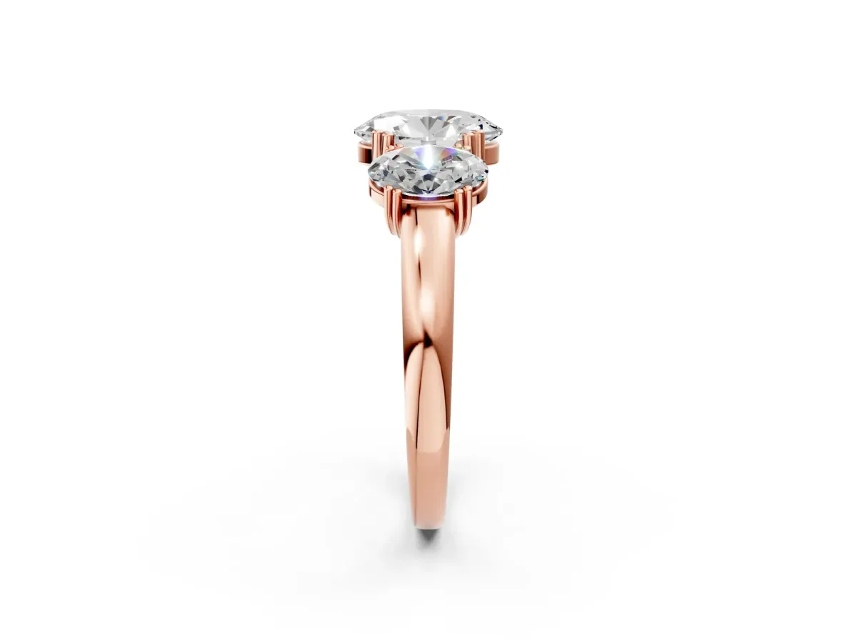 Three-Stone Oval Cut Cut Diamond Ring with Channel Set Band and Four-Prong Setting Rose gold