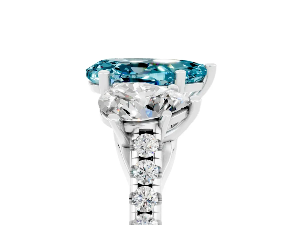 Three-Stone Pear Cut Blue Topaz Ring with Round Pavé Band and Prong Setting Silver