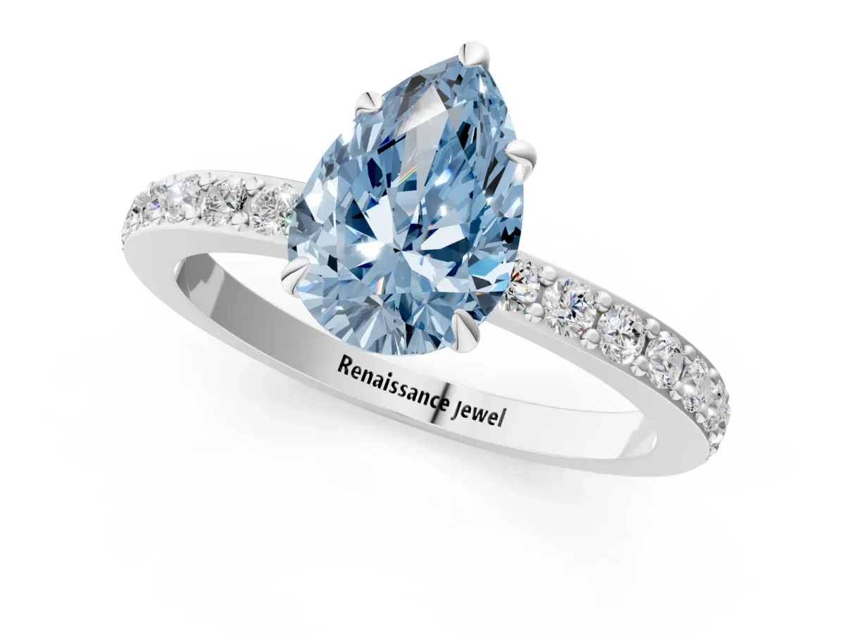 Fancy Blue Pear Cut Diamond Solitaire Engagement Ring with Pavé Band and Four-Prong Setting Silver