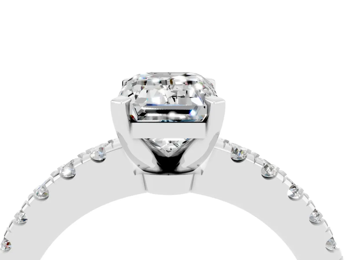 Emerald Cut Solitaire Moissanite with Pavé Band and Four-Prong Setting Silver