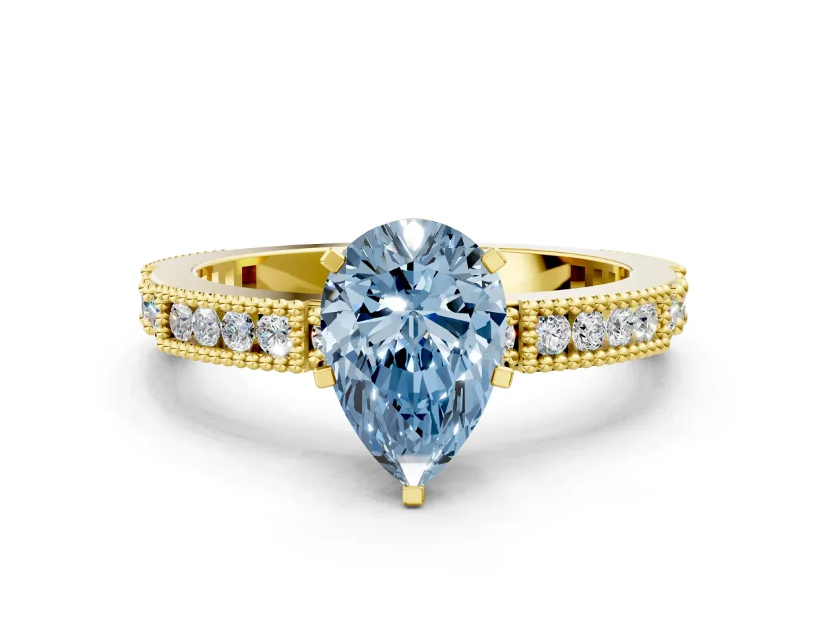 Fancy Blue Pear Cut Solitaire with Pavé Band and Four-Prong Setting Yellow gold