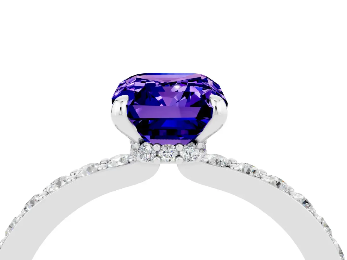 Emerald Cut Tanzanite Solitaire Engagement Ring with Pavé Band and Four-Prong Setting Silver