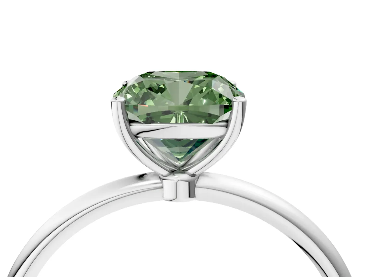 Fancy Green Cushion Cut Cut Solitaire Engagement Ring with Thin Band and Four-Prong Setting Silver