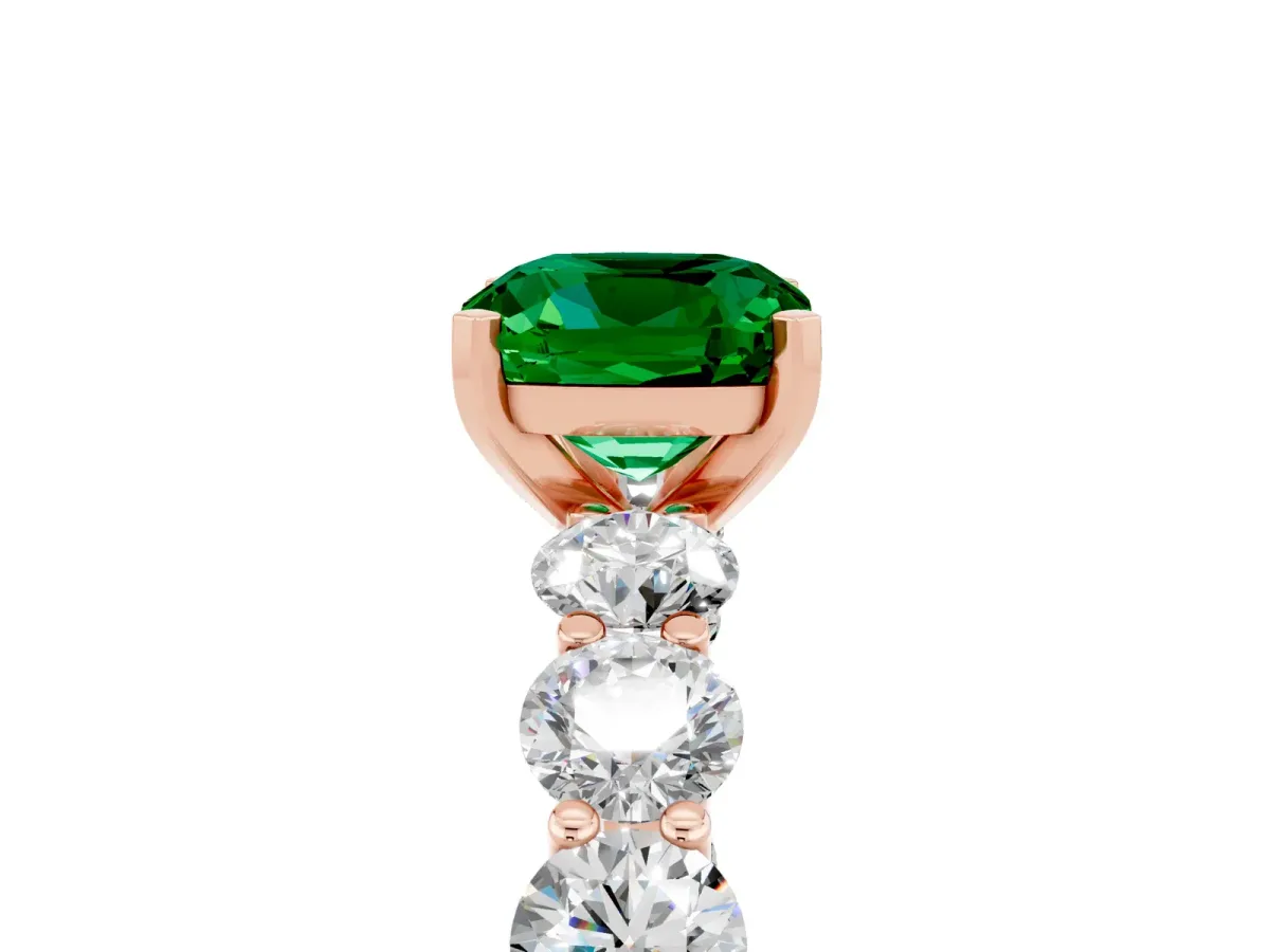 Cushion Cut Emerald Prong Setting with Side Stones on a Pave Band Rose gold