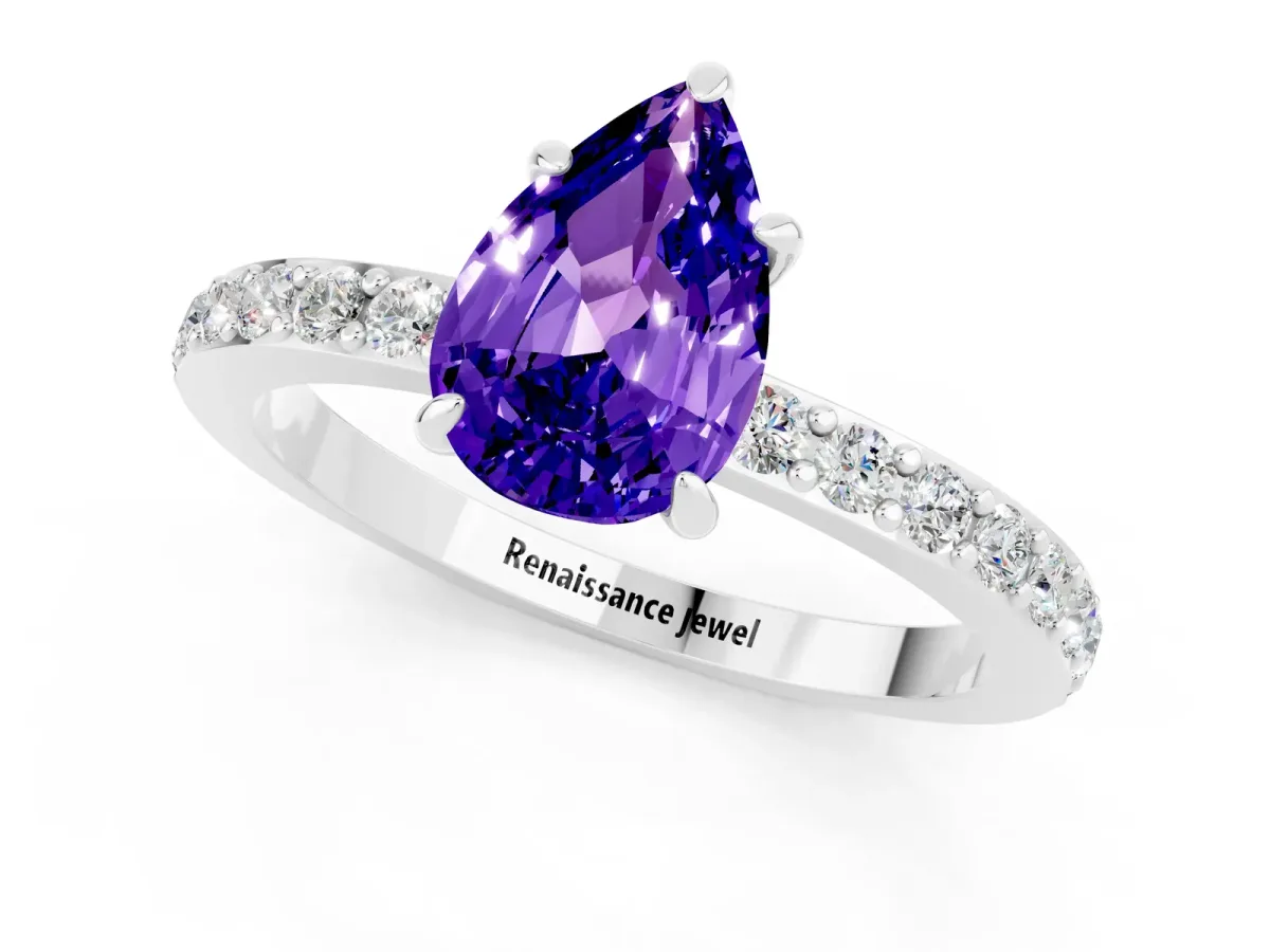 Pear Cut Tanzanite Solitaire Engagement Ring with Pavé Band and Four-Prong Setting Silver