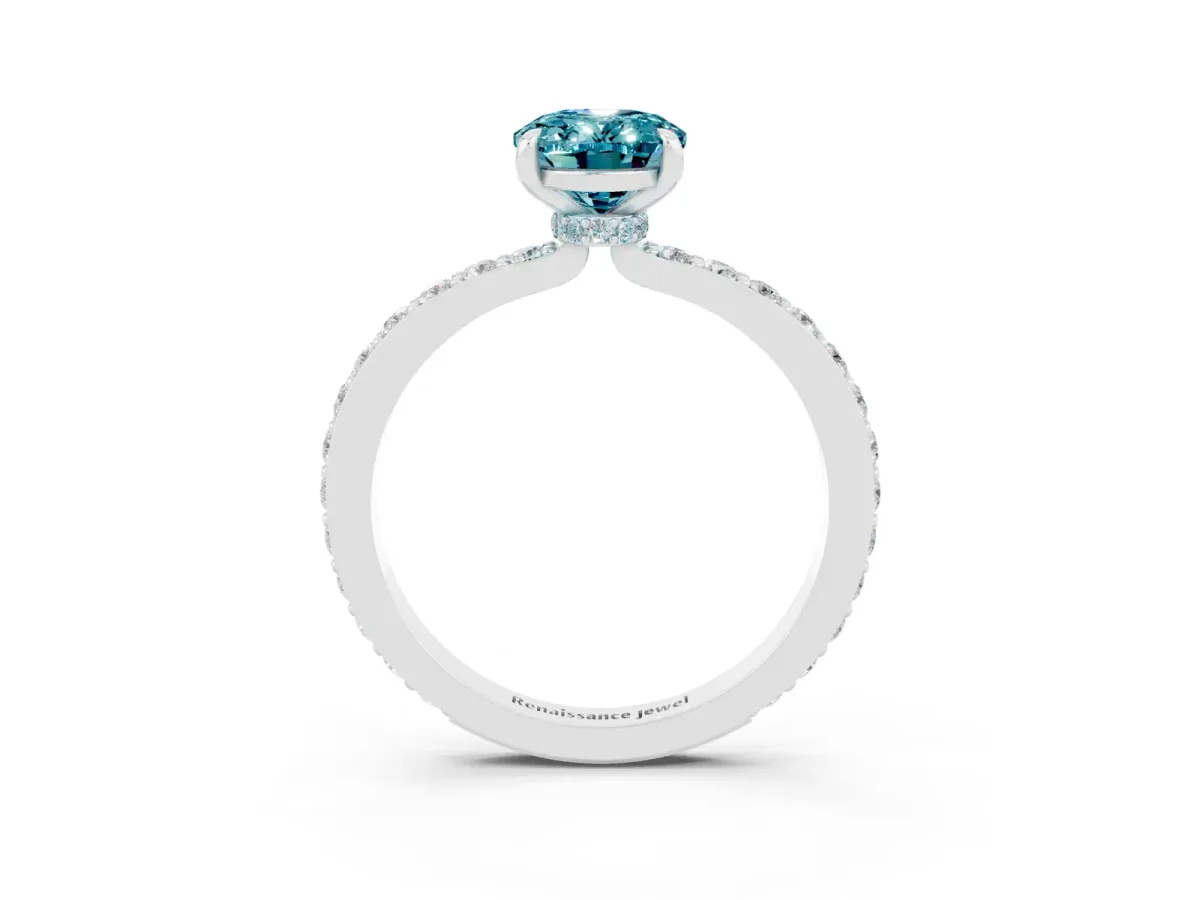 Oval Cut Blue Topaz Solitaire Engagement Ring with Pavé Band and Four-Prong Setting Silver