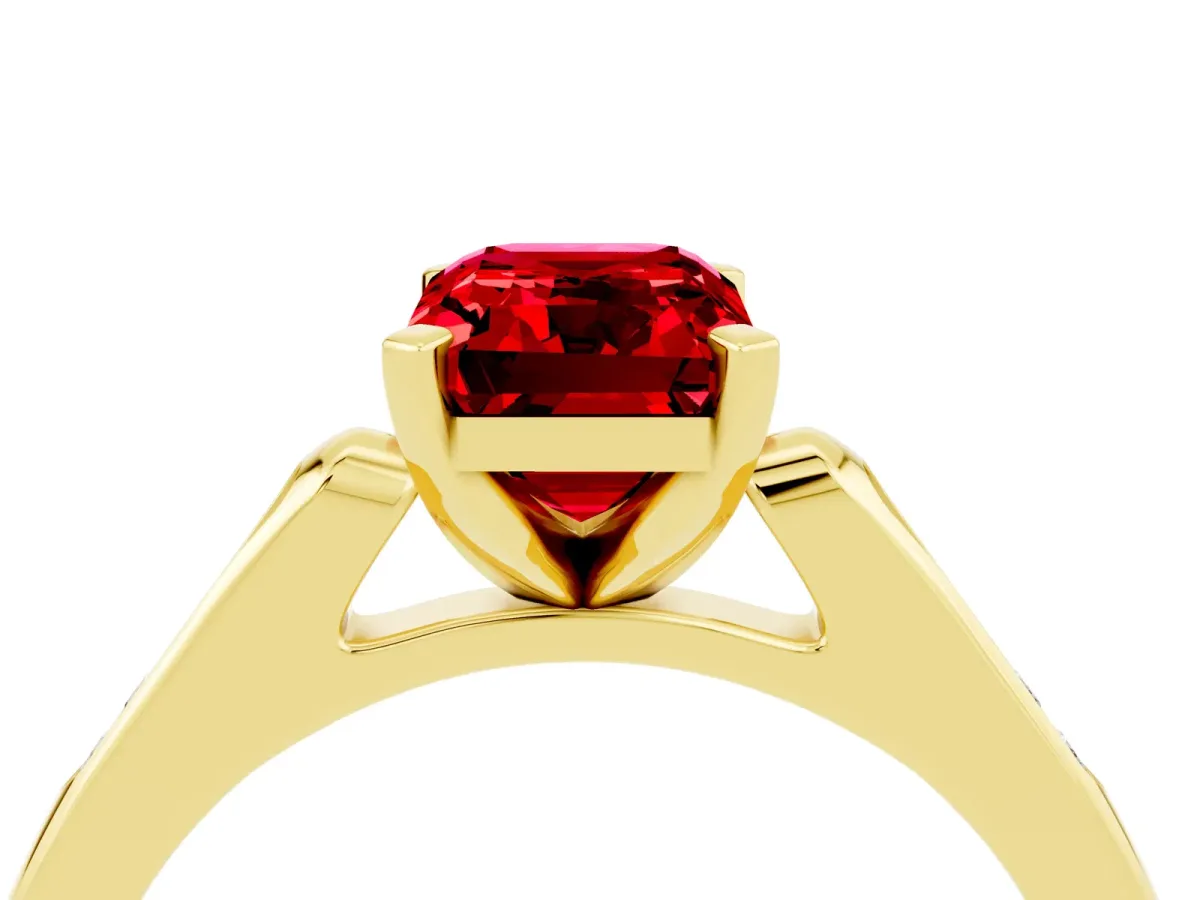 Emerald Cut Ruby Solitaire Ring with Channel Set Round Band and Prong Setting Yellow gold