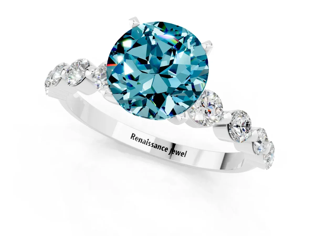Round Cut Solitaire Blue Topaz Ring with Pave Band and Four-Prong Setting Silver