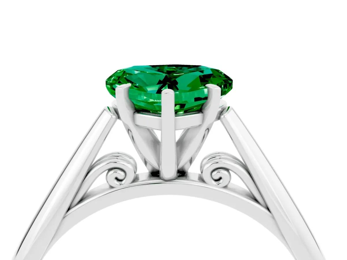 Heart Cut Emerald Solitaire Engagement Ring with Cathedral Setting and Four-Prong Mount White gold