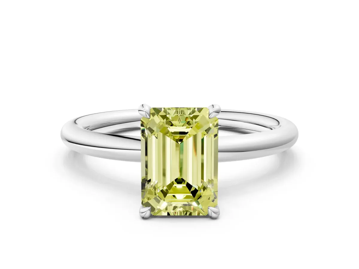 Fancy Yellow Emerald Cut Diamond Solitaire Ring with Thin Band and Four-Prong Setting White gold
