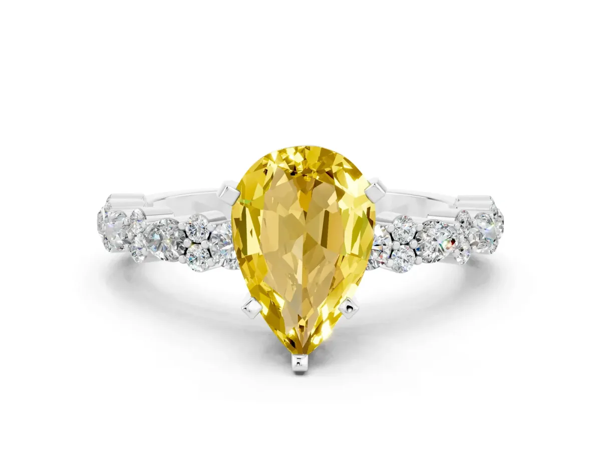Pear Cut Yellow Sapphire Side Stone Solitaire Ring with Round and Four-Prong Setting Platinum
